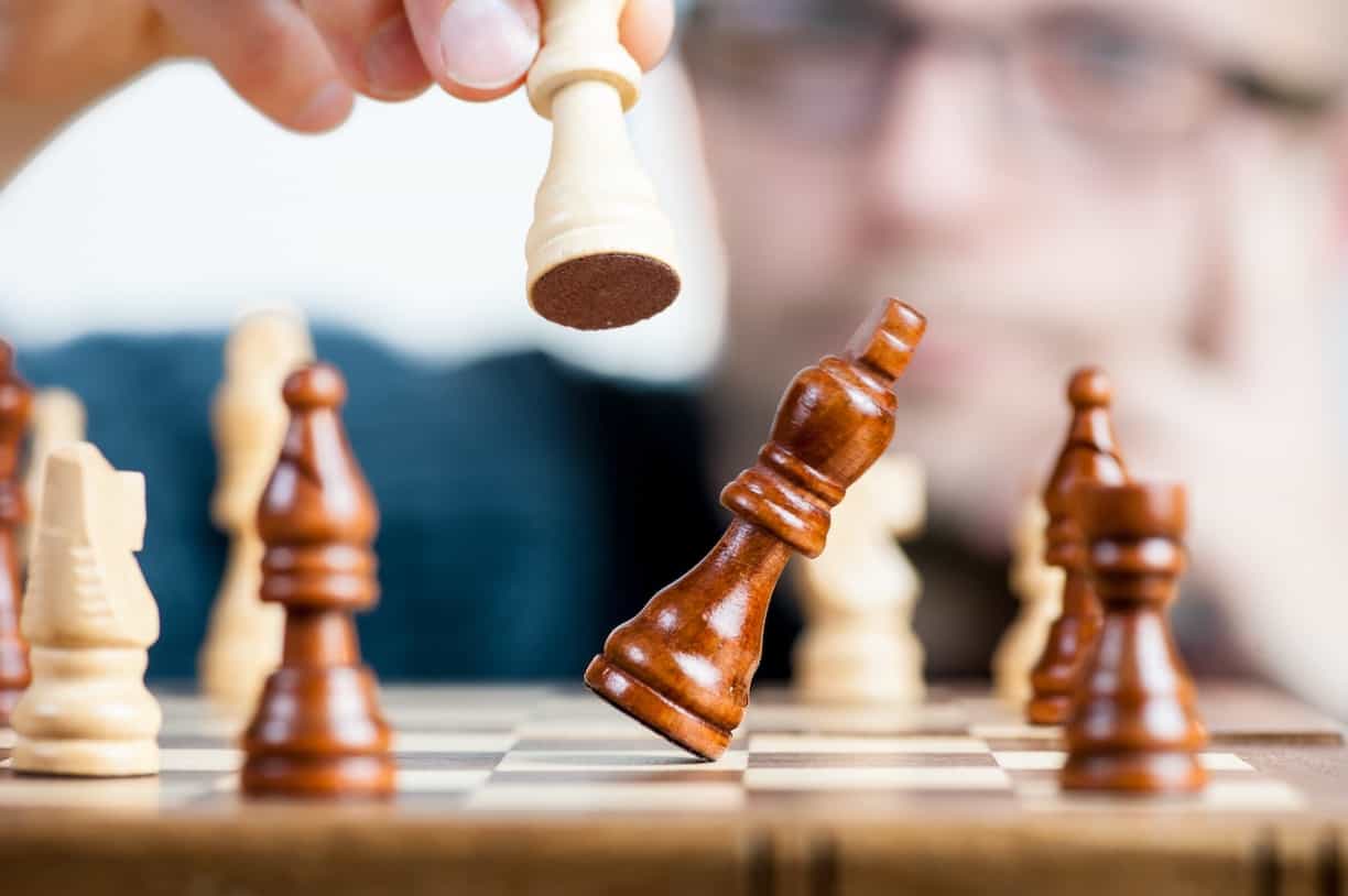 chess play (Competition_Law_Merger_Acquisition)