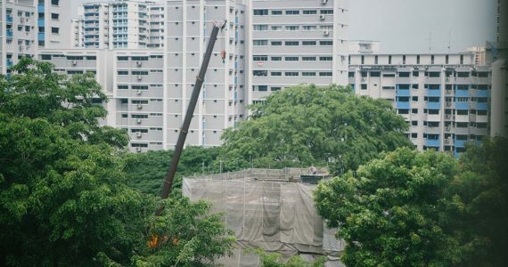 construction site in Singapore against a backdrop of public housing (4 Common Types of Accident Claims in Singapore_Asia_Law_Network)