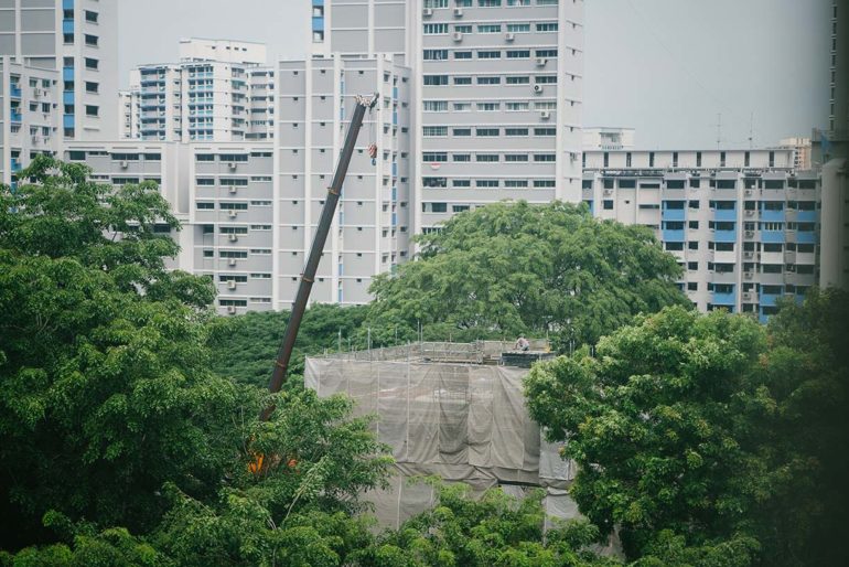 construction site in Singapore against a backdrop of public housing (4 Common Types of Accident Claims in Singapore_Asia_Law_Network)