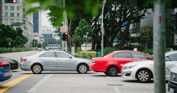 cars on a road in Singapore (What to do if you get into a traffic accident with a foreign vehicle_Asia_Law_Network)