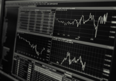 Stock trading monitor (black and white) (Dual Class Shares_Asia_Law_Network)