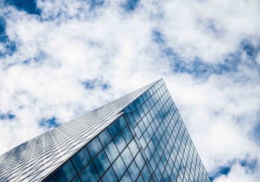 view of a sky from the bottom of the building (Managing_growing_law_firm_Asia_Law_Network)