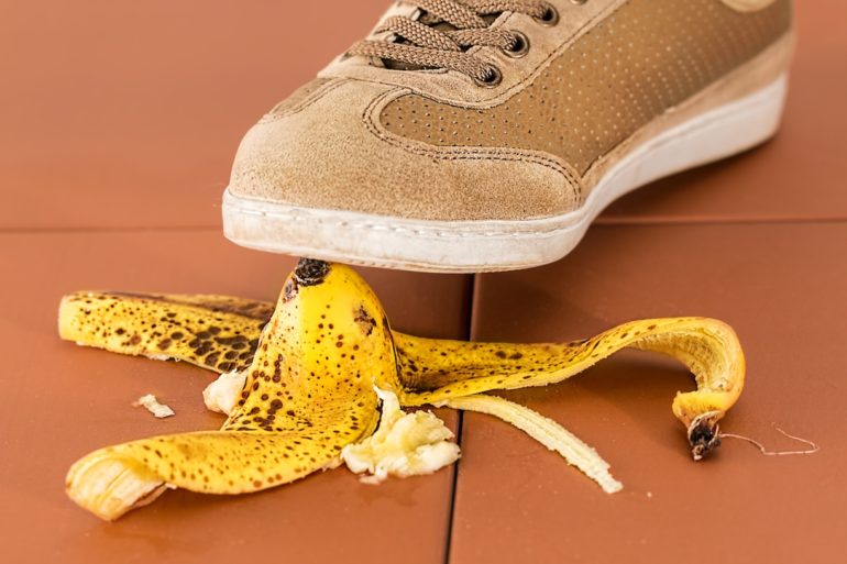 shoe stepping on banana skin on the floor (The_SLIP_TRIP_Protocol_Asia_Law_Network)